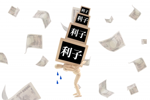 お金を手に頭を抱える。ふじみ野市で債務整理の無料相談が弁護士にできます